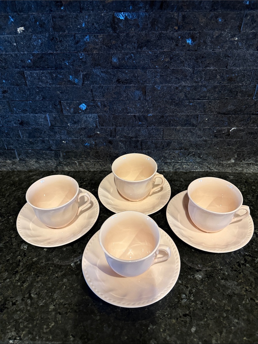 Rose Petal China, four tea cups, six saucers, and six sandwich plates.
